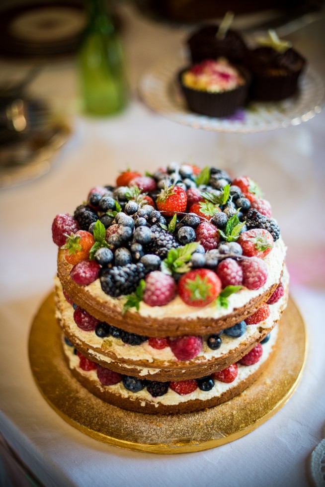 Naked wedding cake with berries